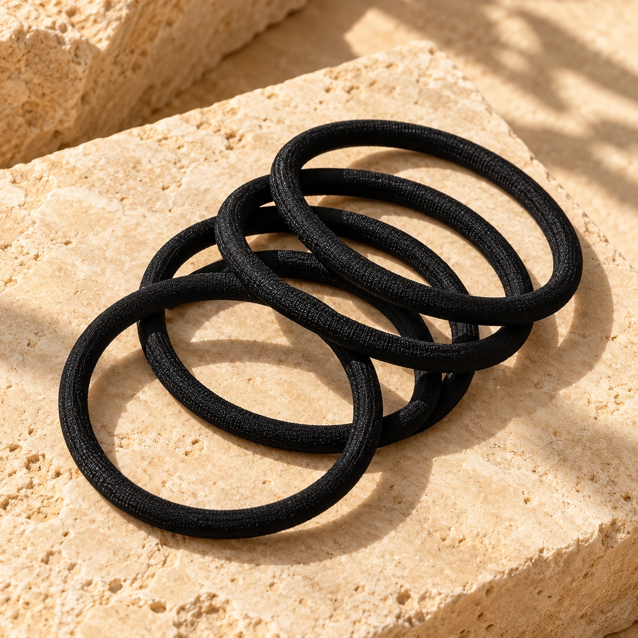 Goody Ouchless black 4 mm hair ties, 30 count, illustration of this kind of item